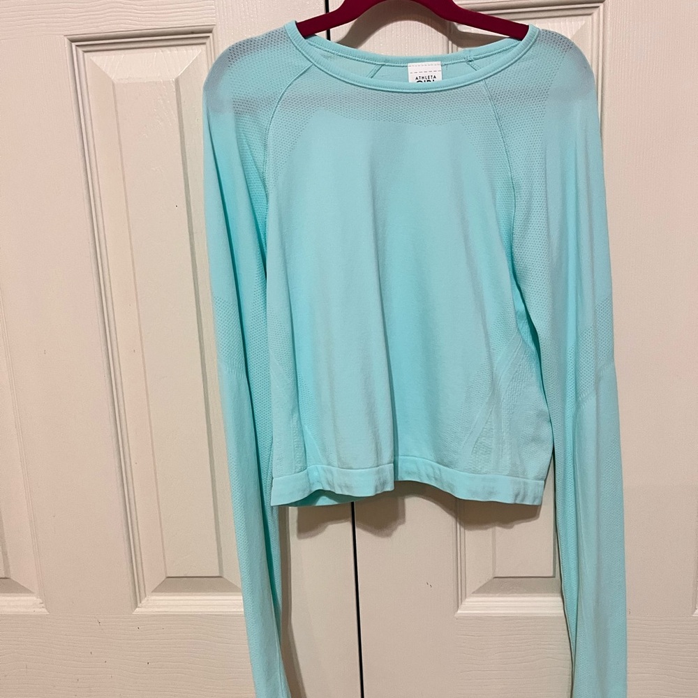 Teal Athleta girl power up seamless cropped shirt size large/12.